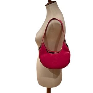 Saddle style adjustable straps hot pink handbag only used in a photo shoot